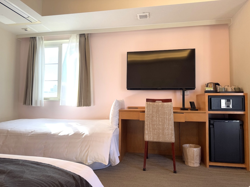 RAMデラックスルーム 禁煙 / スウェーデン製ベッド (大人3名利用時のみシングルソファーベッド1台が付きます) 客室6 | ホテルパームロイヤルリゾート国際通り