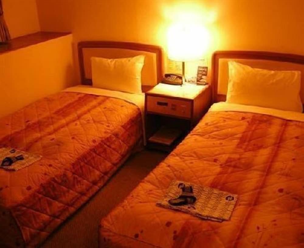 ツインルーム 喫煙可 客室2 | ビジネスホテルニッセイ