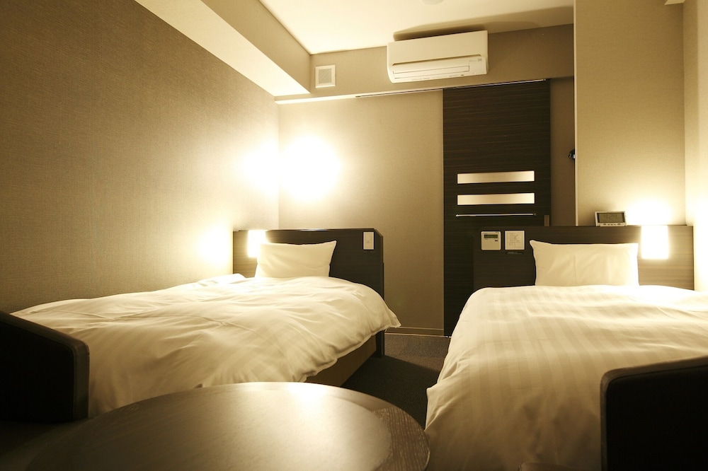 ツインルーム　禁煙（22.2㎡~22.9㎡) 客室3 | 天然温泉　霧桜の湯　ドーミーイン鹿児島