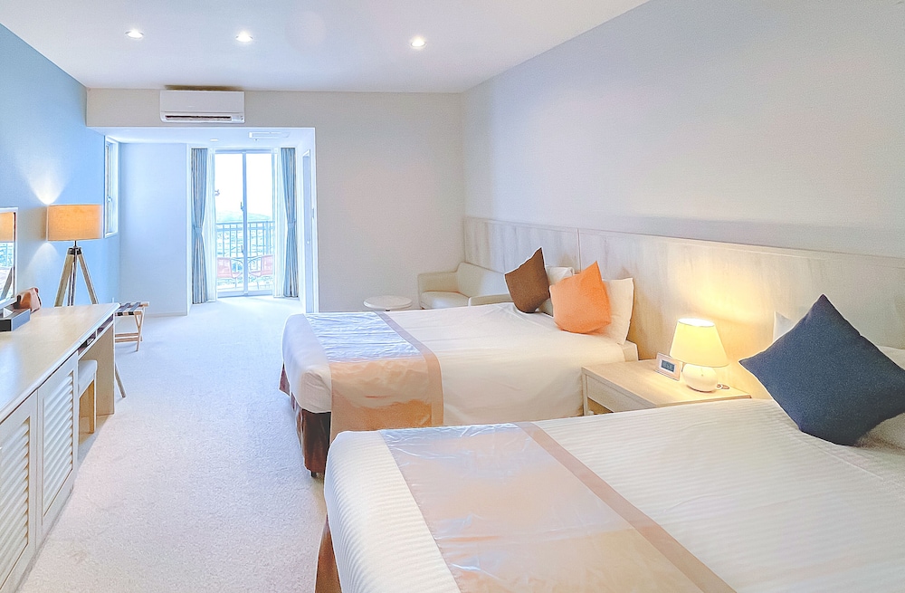 デラックス ツインルーム 1 ベッドルーム オーシャンビュー | ユインチホテル南城