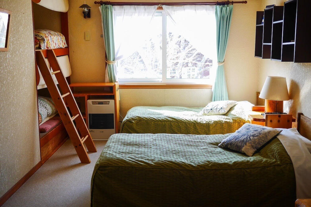 ツインルームシングルサイズベッド 2 台 客室12 | カントリー イン ミルキー ハウス