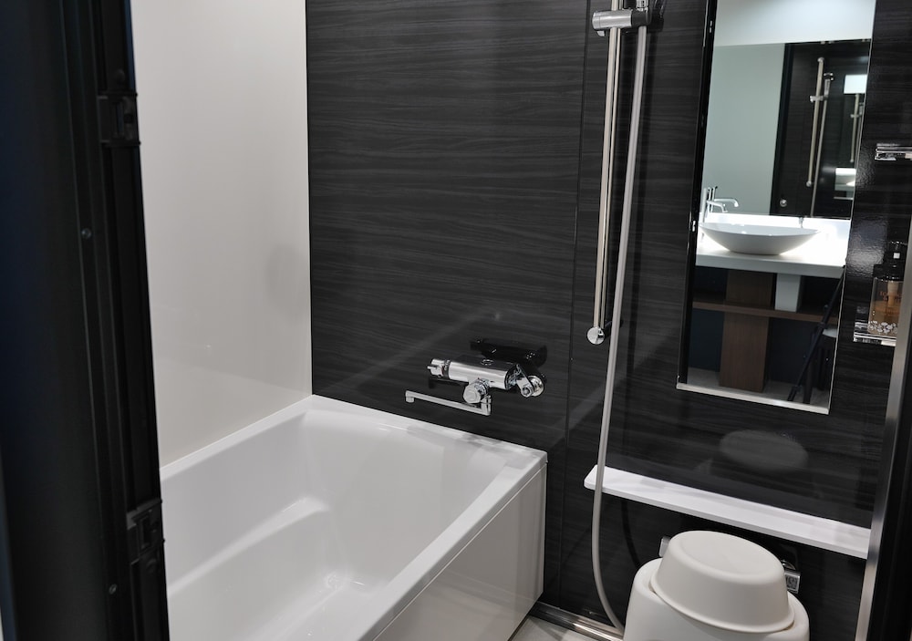 モデレートツインルーム 湖畔側 禁煙 バスルーム1 | サロマ湖 鶴雅リゾート