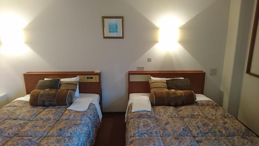 スタンダード ツインルームシングルサイズベッド 2 台禁煙 客室1 | くれたけインいわた