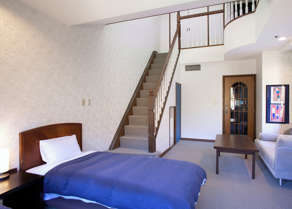 コルチナフロア・メゾネット ゲレンデ側（禁煙） 客室2 | ホテルグリーンプラザ白馬