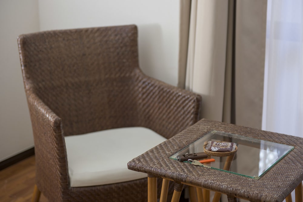 セミダブルサイズベッド 1 台禁煙 客室1 | ホテルパティーナ石垣島