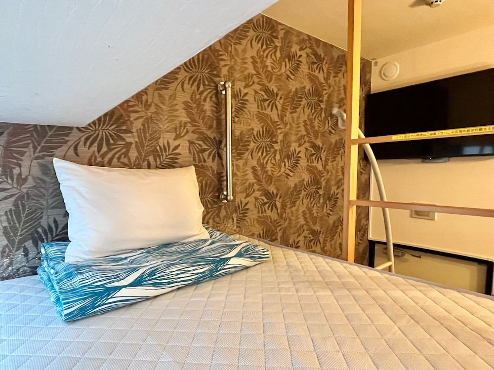 スタンダード ルーム 喫煙可 (当ホテルでは全プラン2泊以下の場合ご滞在中の清掃はございません3泊目以降から清掃のご案内をさせて頂きます) 建物のデザイン0 | ホテルストーク那覇新都心