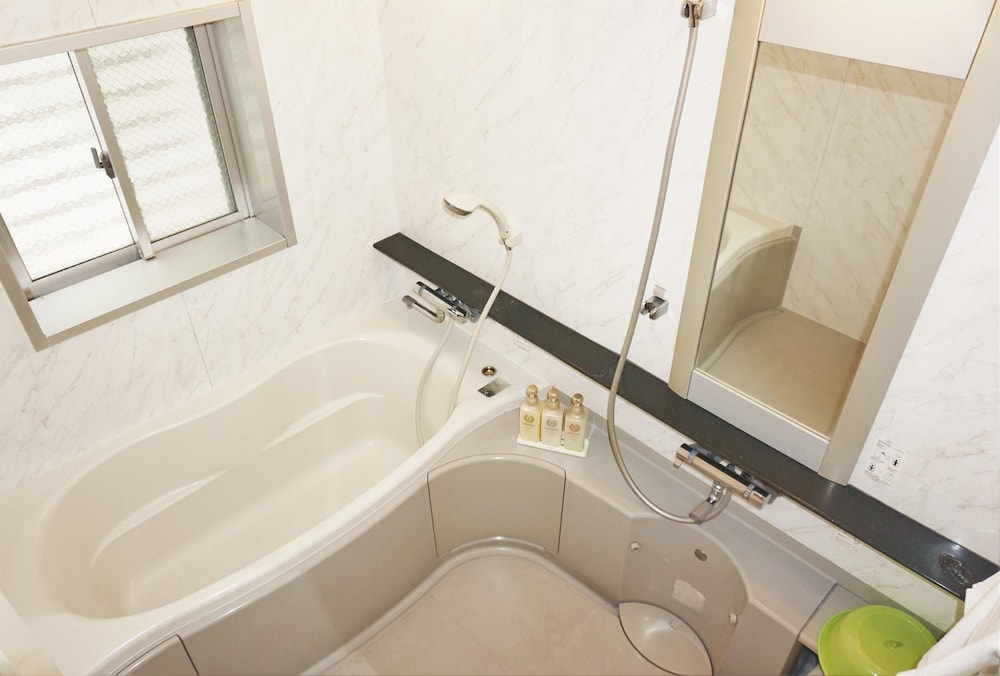 オーシャンビュースイート キッチン付 バスルーム0 | 沖縄オーシャンフロントホテル