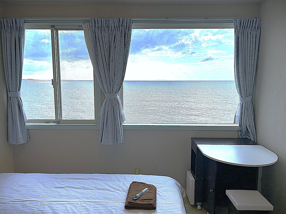 エコノミー ダブルルーム 1 ベッドルーム 禁煙 オーシャンビュー 客室1 | 沖縄オーシャンフロントホテル