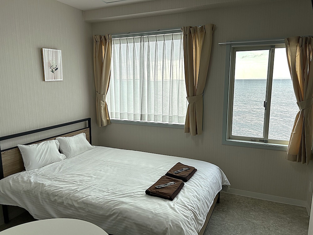 ベーシック ダブルルーム 1 ベッドルーム 禁煙 オーシャンビュー 客室1 | 沖縄オーシャンフロントホテル