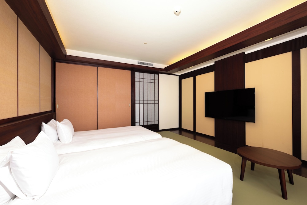 クラシックジャパニーズルーム シングルベッド2台 客室1 | グランドメルキュール沖縄残波岬リゾート