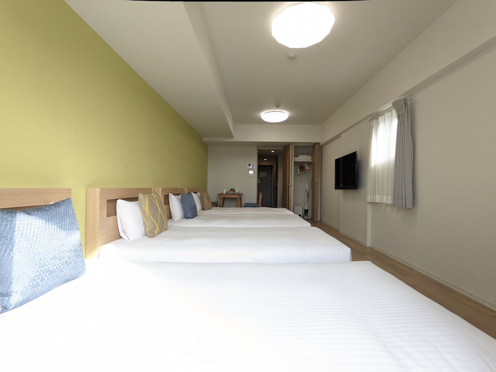 デラックス 4 人部屋 ベッド (複数台) 禁煙 シティビュー 客室4 | エスリードホテル難波サウス Ⅲ