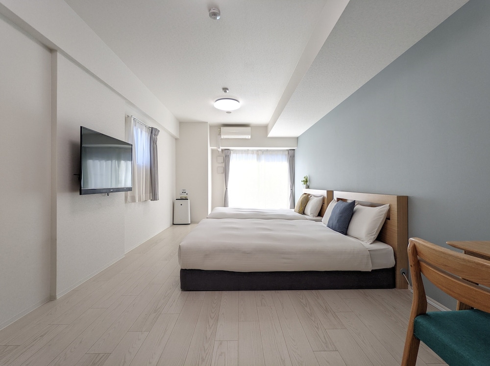 シティ アパートメント ダブルベッド 2 台 禁煙 | エスリードホテル難波サウス Ⅲ