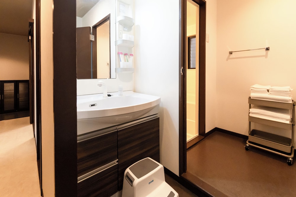 スーペリア ペントハウス 3 ベッドルーム 禁煙 パークビュー バスルームのシンク0 | プレシオーソ梅田