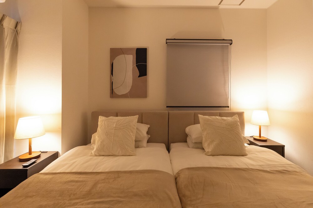 スーペリア ペントハウス 3 ベッドルーム 禁煙 パークビュー 客室1 | プレシオーソ梅田