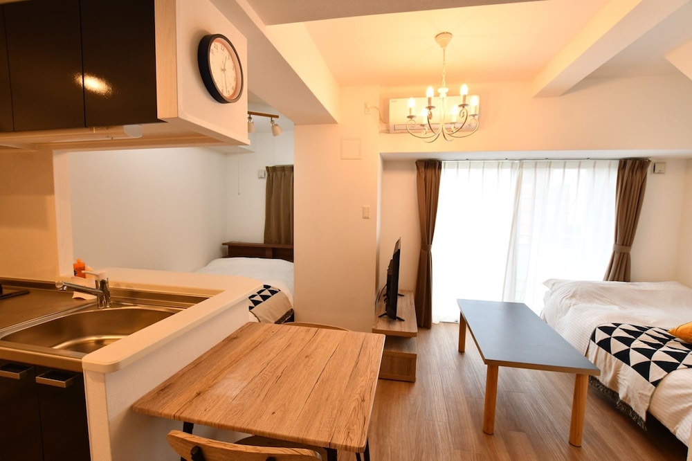 デラックス アパートメント リビング エリア4 | Riverside Inn Hakata