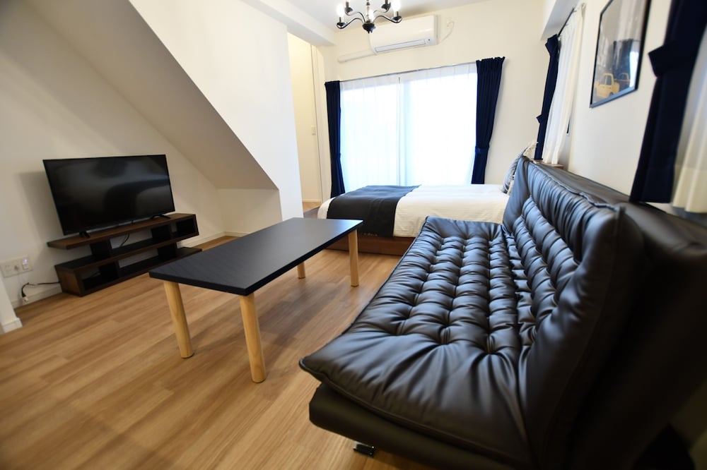 デラックス アパートメント リビングルーム4 | Riverside Inn Hakata