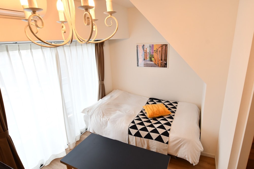 デラックス アパートメント リビング エリア3 | Riverside Inn Hakata