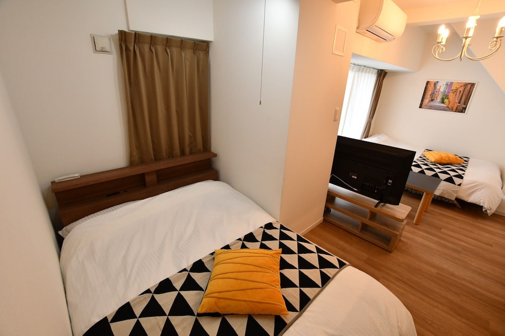 デラックス アパートメント リビングルーム1 | Riverside Inn Hakata