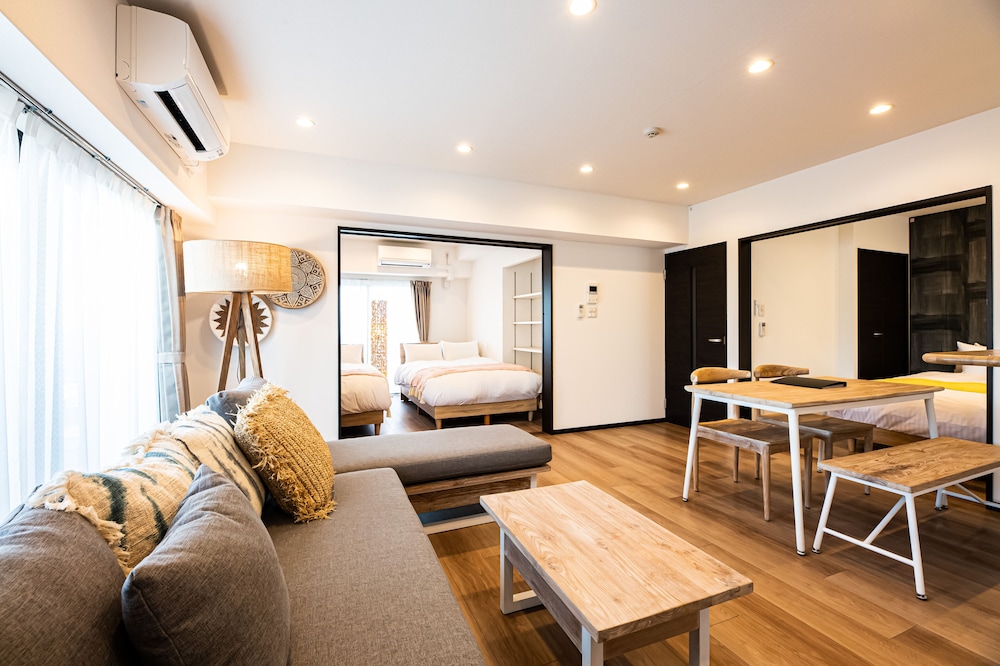 デラックス アパートメント 禁煙 リビングルーム1 | Tomariehotel & condominium