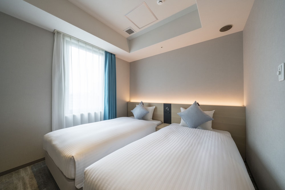 スタンダード ツインルーム 禁煙 客室1 | ホテル オリエンタル エクスプレス 福岡天神