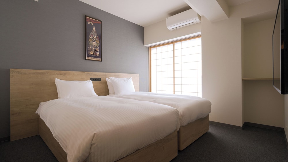 スーペリア2ベッドルームジャパニーズアパートメント 7人用 禁煙 客室1 | MIMARU大阪 心斎橋 EAST