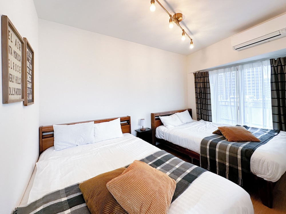 【デラックスルーム】ダブルベッド2台 ソファベッド1台 キッチン付 禁煙 客室8 | レガティオ博多