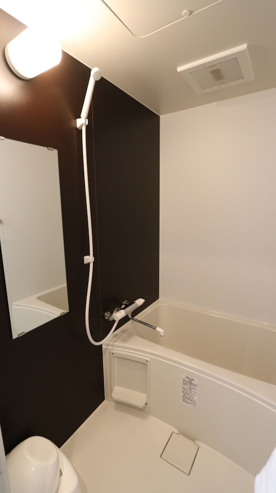 【デラックスルーム】ダブルベッド2台 ソファベッド1台 キッチン付 禁煙 客室1 | レガティオ博多