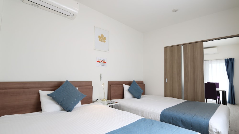 【デラックスルーム】ダブルベッド2台 キッチン付 禁煙 | レガティオ 博多駅東