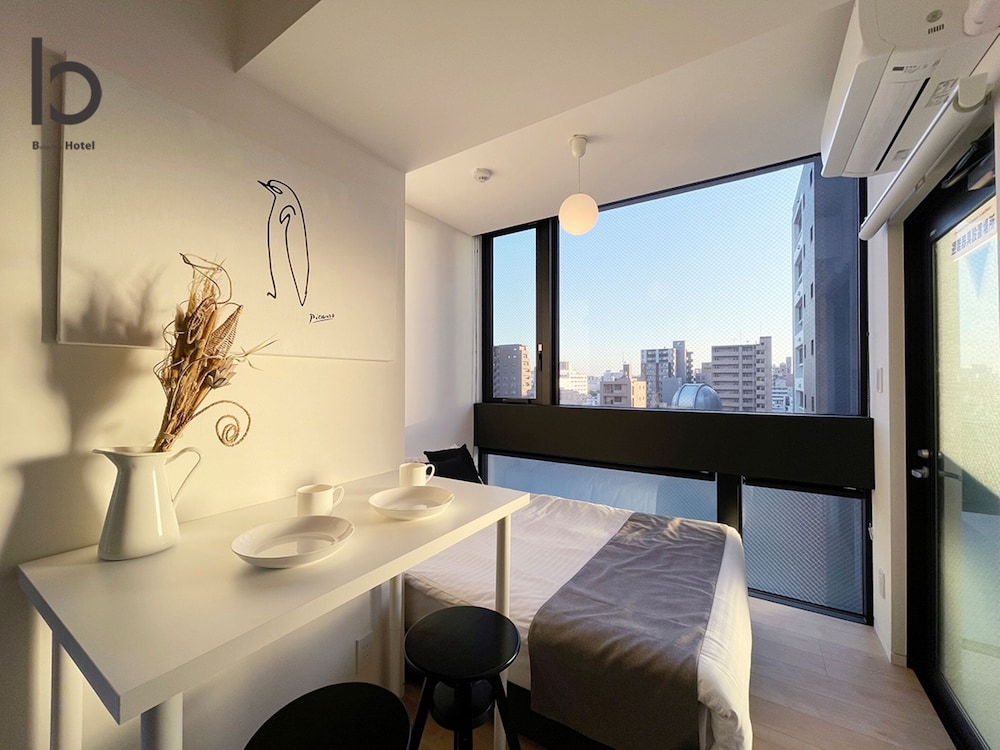 デラックス コンドミニアム 1 ベッドルーム 禁煙 シティビュー (bHotel Nekoyard 601) 客室内のダイニングエリア3 | b hotel Neko Yard 広島