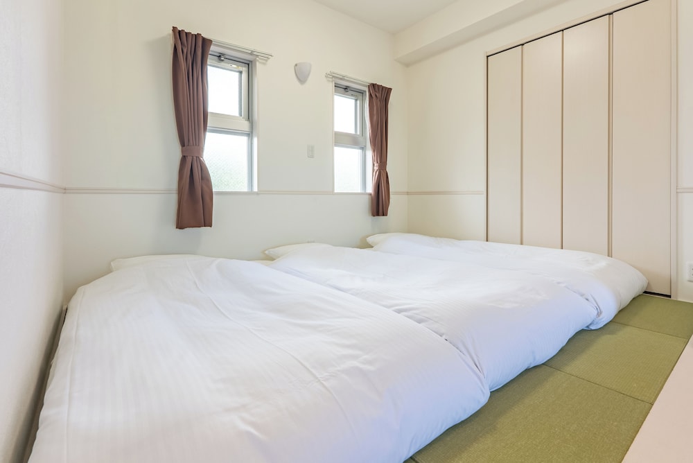 ファミリールーム 和洋室 禁煙 客室2 | オディシス恩納リゾートホテル