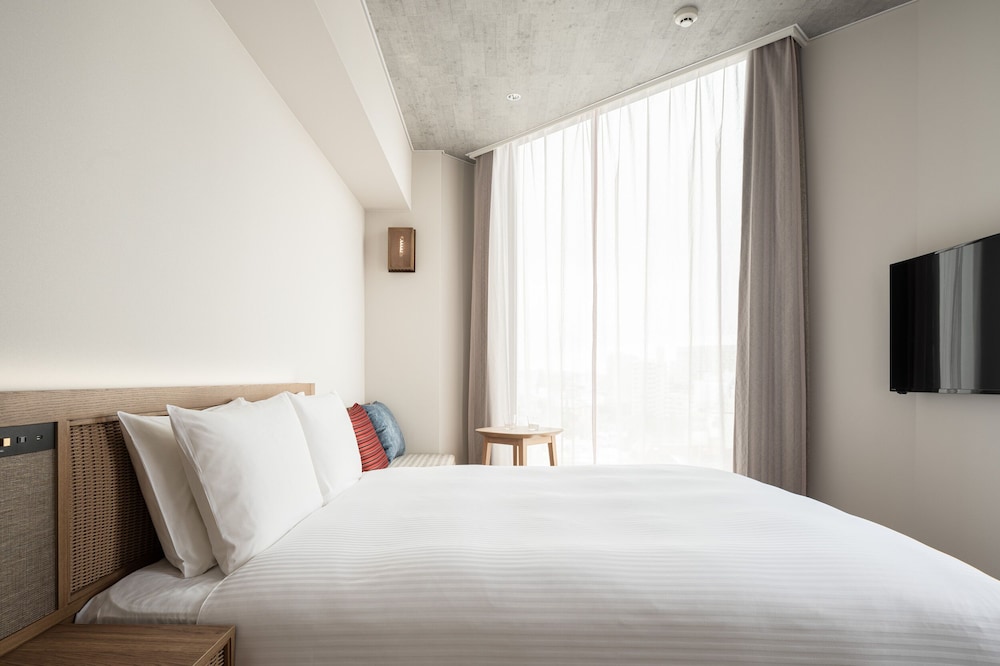 ダブルルーム 禁煙 客室1 | ネストホテル那覇久茂地