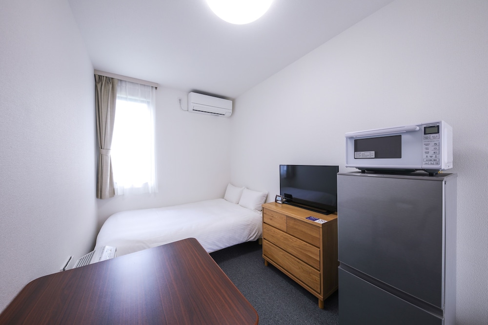 セミダブルルーム、禁煙 (23時以降のチェックインはできませんのでご注意ください) | HOTEL R9 The Yard 宮古島