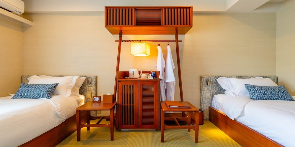 ユニバーサルツインルーム 禁煙 客室1 | オイレ バイ ディーエスエイチ リゾーツ