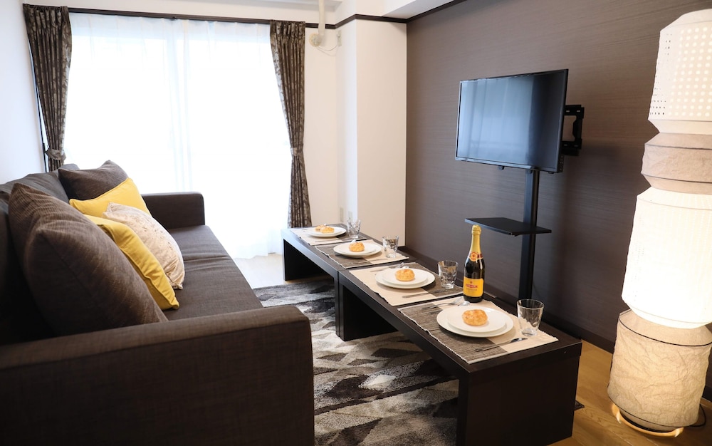 アパートメント 禁煙 (403) リビング エリア1 | ケイアイコンホテルズ池下