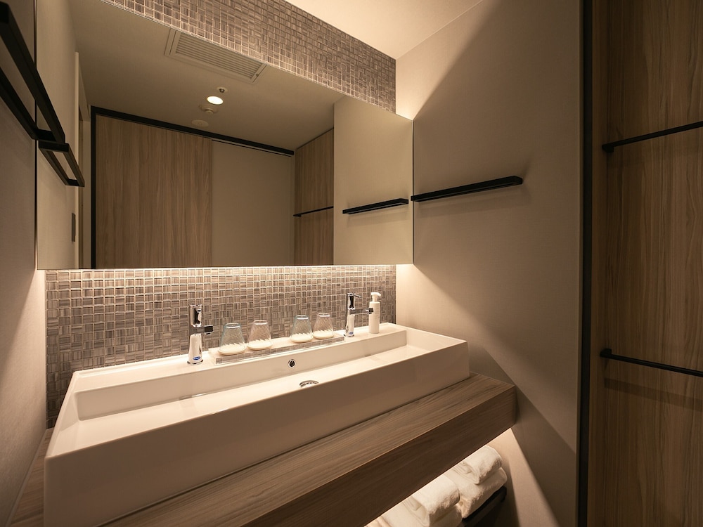 プレミア ツインルーム 禁煙(1-2名), ウェルカムラウンジアクセス付き バスルーム1 | オリエンタルホテル ユニバーサル・シティ