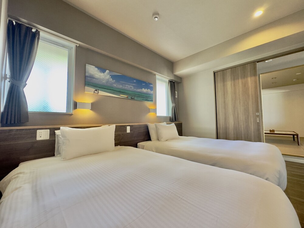 スタンダード・スイートコンド 禁煙 客室28 | コーラルパレス恩納 by サンセットアベニュー