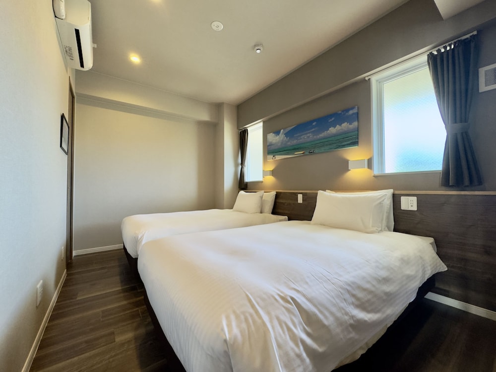 スタンダード・スイートコンド 禁煙 客室25 | コーラルパレス恩納 by サンセットアベニュー