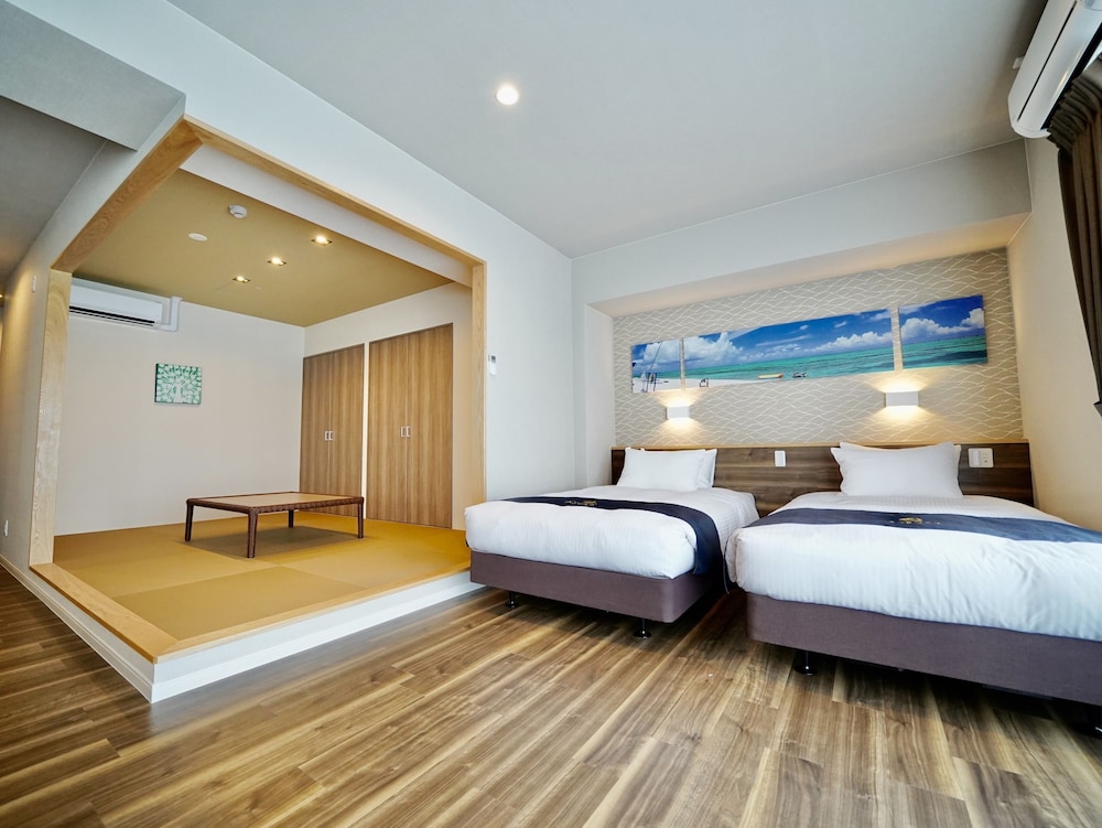 スタンダード・スイートコンド 禁煙 客室2 | コーラルパレス恩納 by サンセットアベニュー