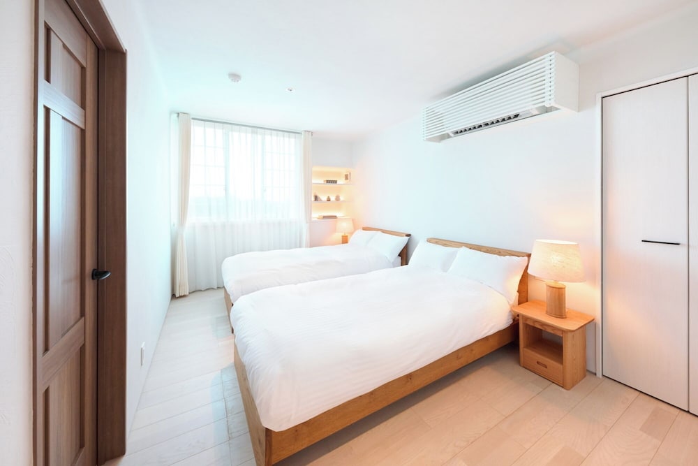 デラックス4ベッドルーム 1F 禁煙 客室1 | プリシアリゾート ヨロン