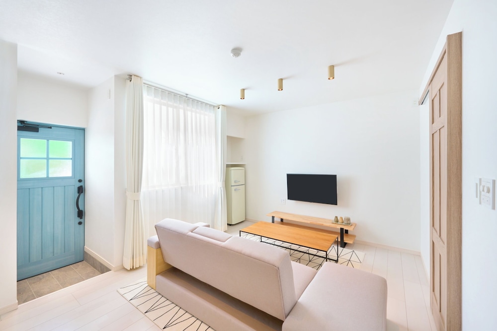 スタンダードハリウッドツイン 1F 禁煙 リビング エリア0 | プリシアリゾート ヨロン