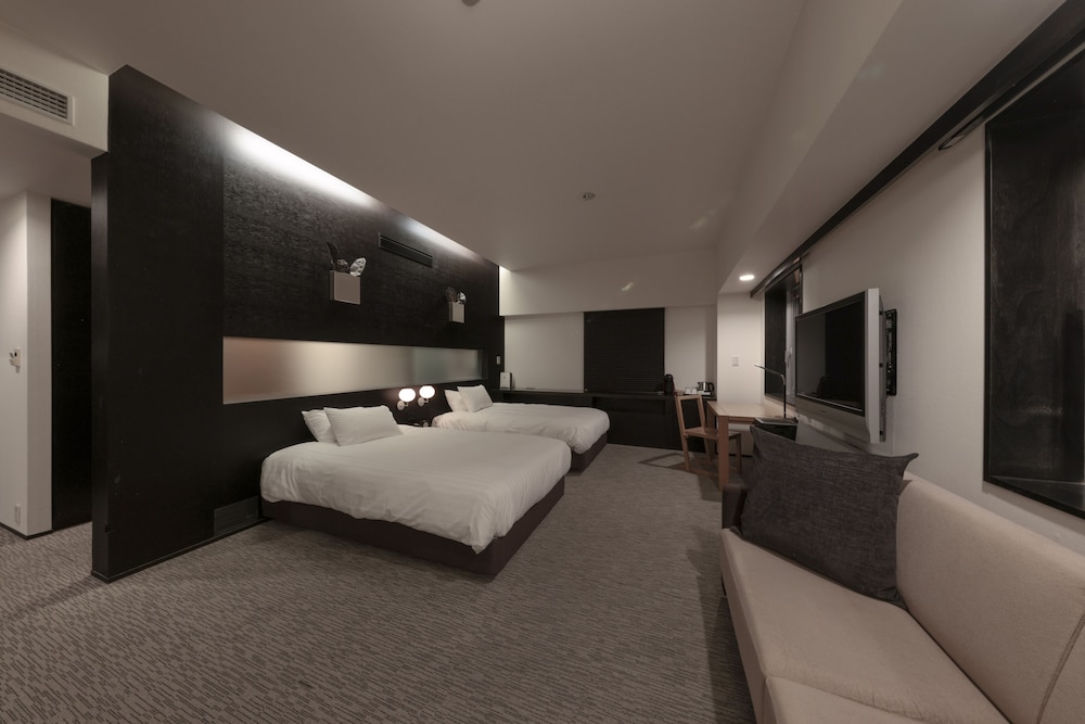 デラックス ツインルーム 禁煙 (3歳から有料) 客室1 | 富良野ナチュラクスホテル