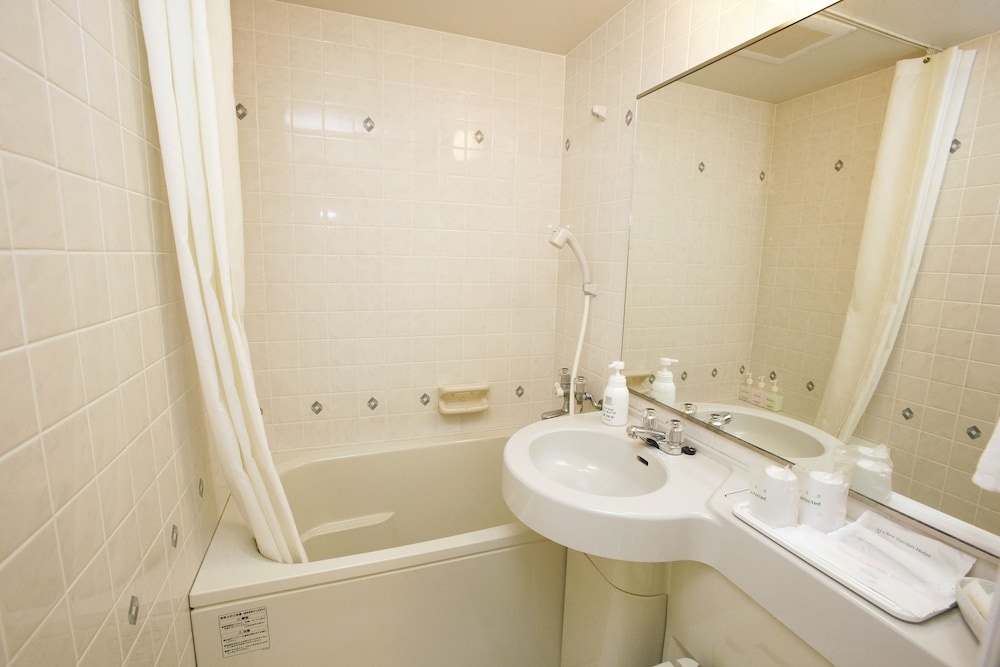 スタンダード ダブルルーム 喫煙可 バスルーム0 | リブレ ガーデン ホテル