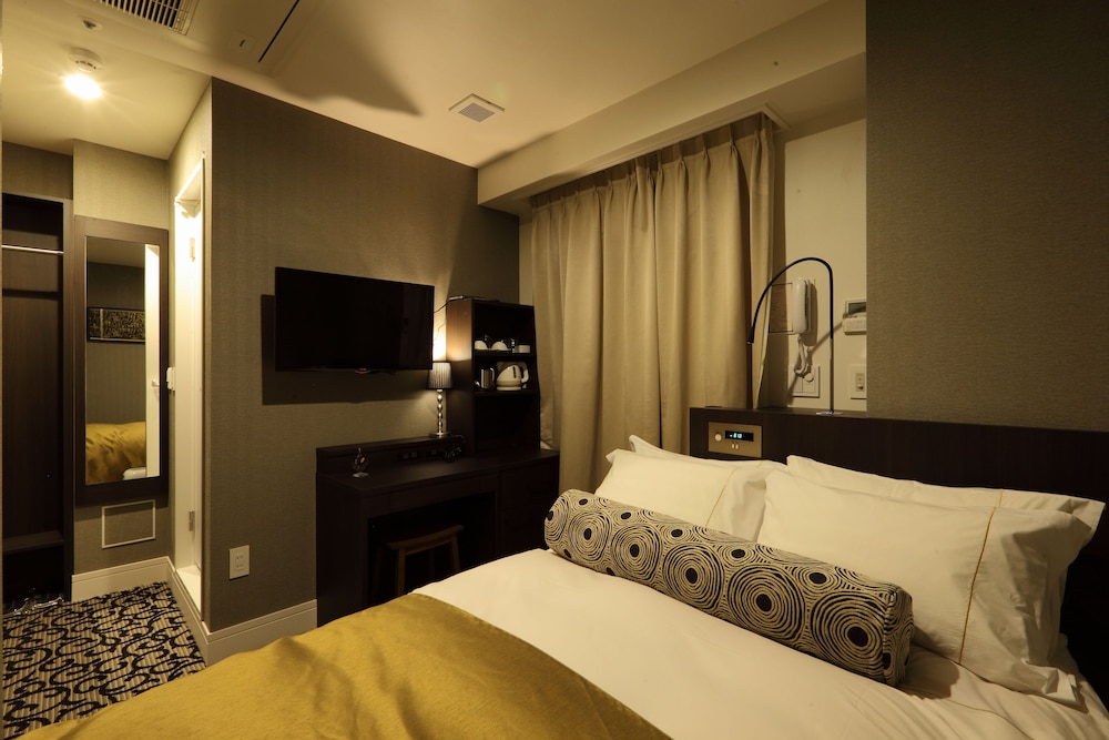 スタンダード セミダブルルーム 喫煙（セミダブルベッド1台） 客室1 | センチュリオン ホテル グランド 赤坂