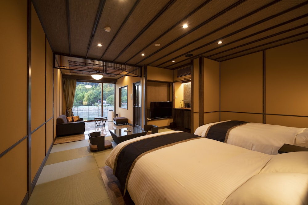 [蘭] 宇治川眺望 半露天風呂付デラックスツイン (禁煙) | 京都宇治 花やしき浮舟園