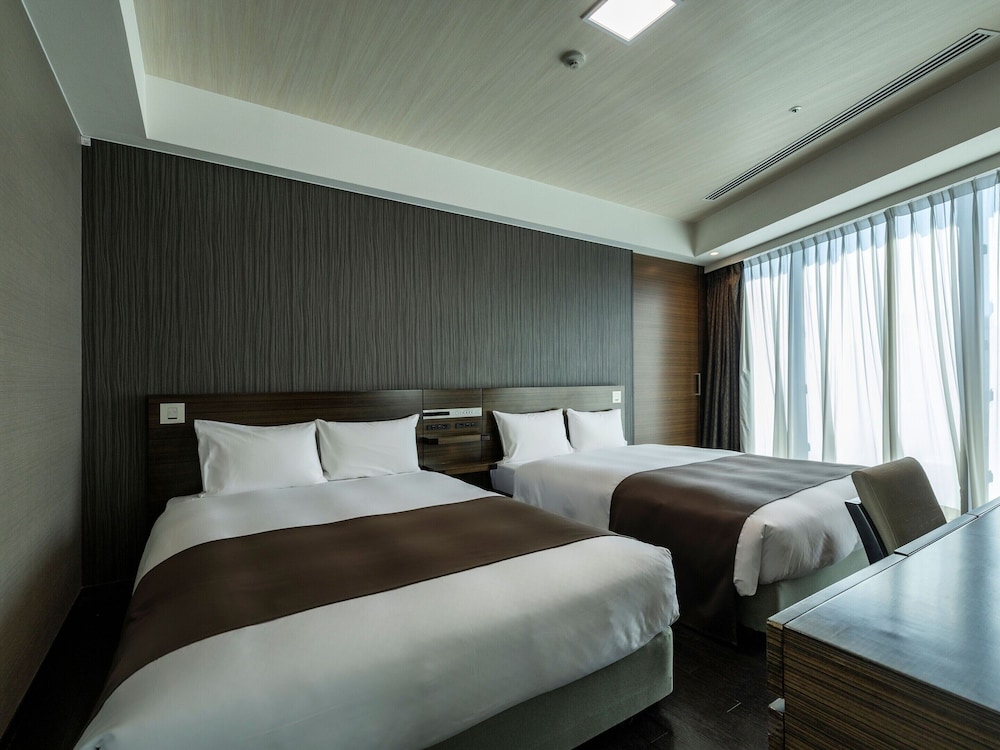 【禁煙】デラックススイート/82㎡/140㎝幅ベッド×2台 | KOKO HOTEL Premier 博多