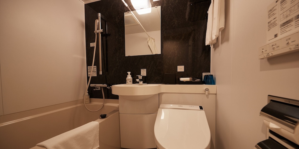 スタンダード ツインルーム 禁煙 バスルーム1 | THE GRAND HOTEL GINOWAN