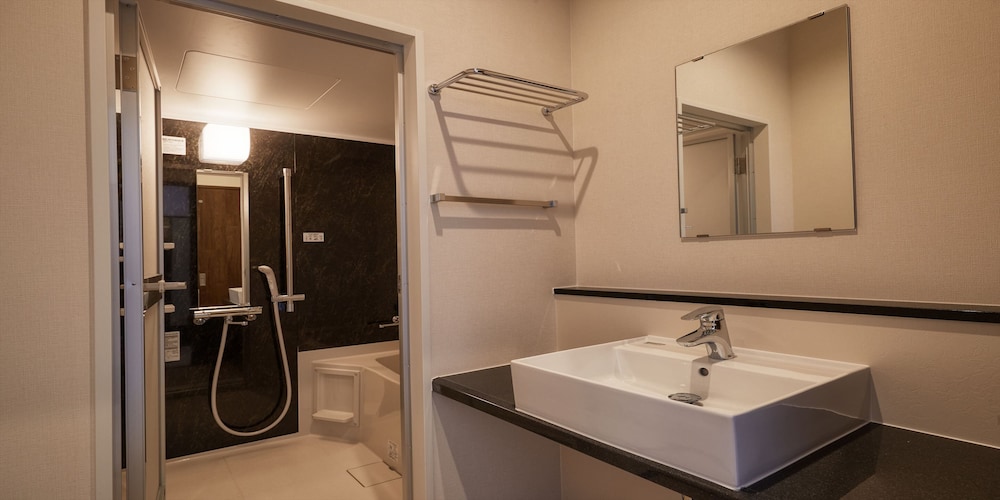 デラックス ツインルーム 禁煙 バスルーム0 | THE GRAND HOTEL GINOWAN