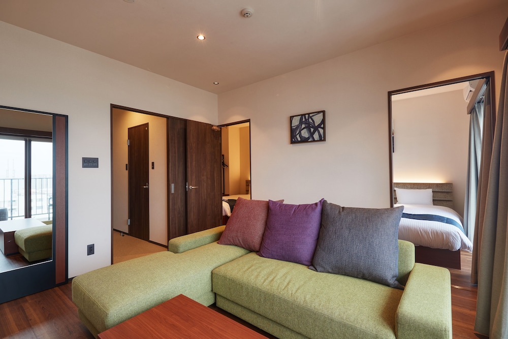 ジュニア スイート 禁煙 リビング エリア1 | THE GRAND HOTEL GINOWAN