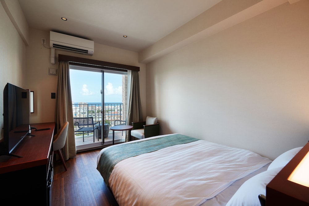 スタンダード ダブルルーム クイーンベッド 1 台 禁煙 | THE GRAND HOTEL GINOWAN