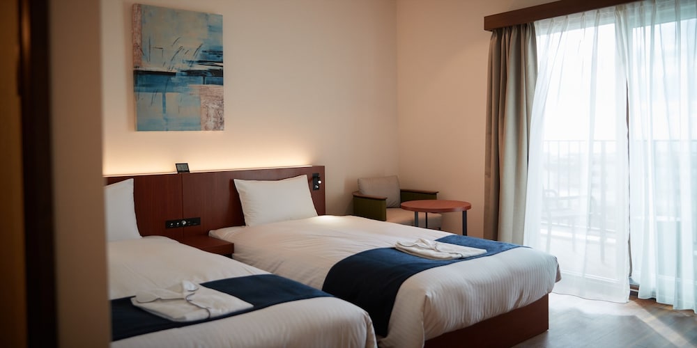 デラックス ツインルーム 禁煙 客室7 | THE GRAND HOTEL GINOWAN